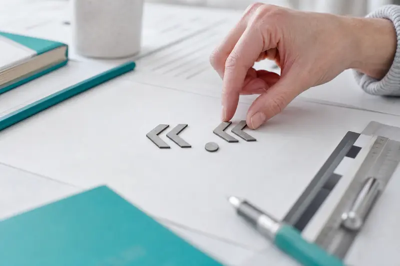 Composition typographique montrant guillemets français et point pour une citation